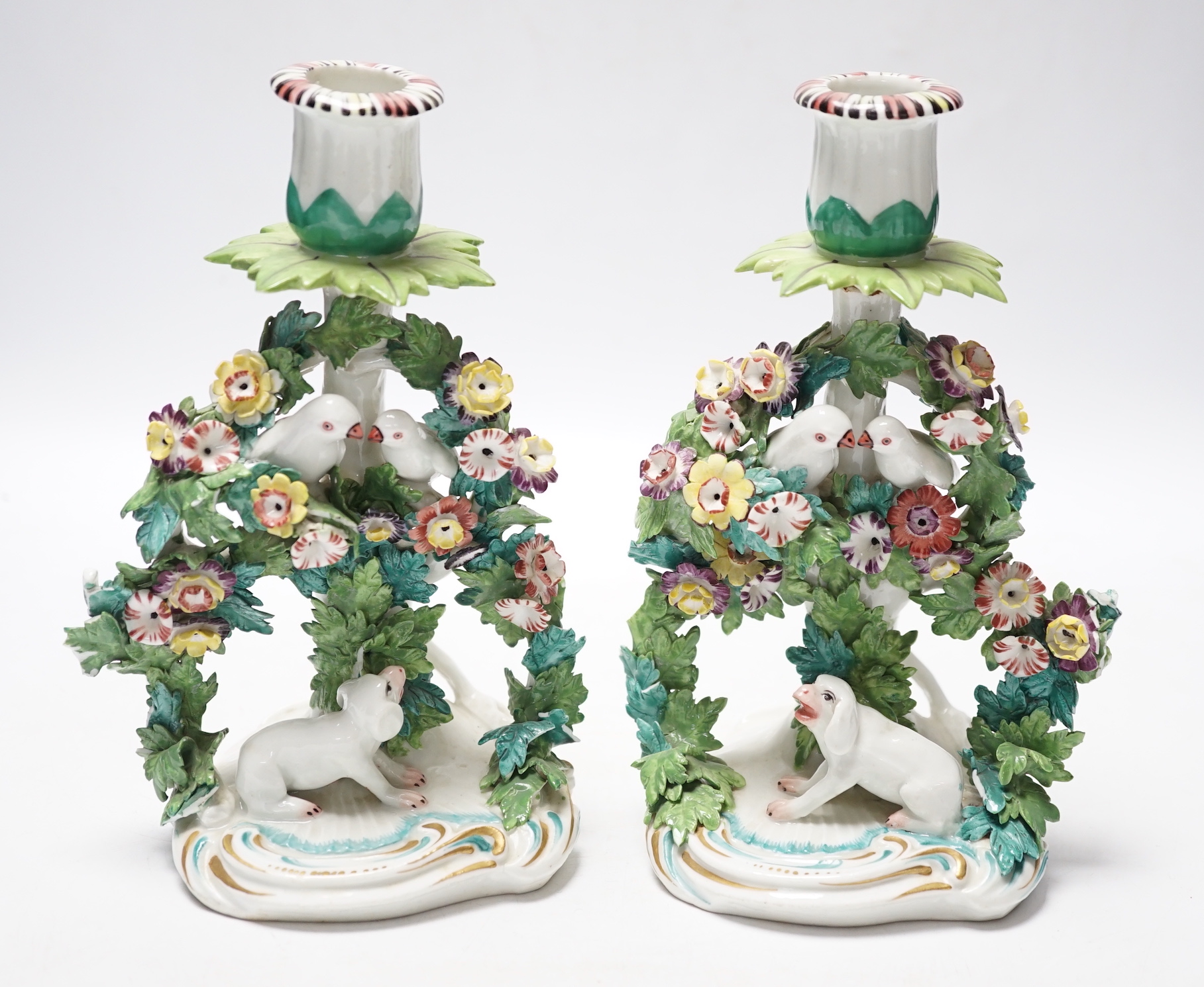 A pair of Samson porcelain chambersticks, in Derby style, with floral encrusted decoration, 19cm high